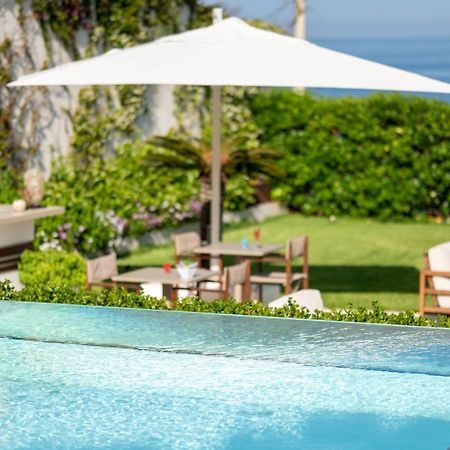 Unico Boutique Hotel D'Arte Мондело Екстериор снимка