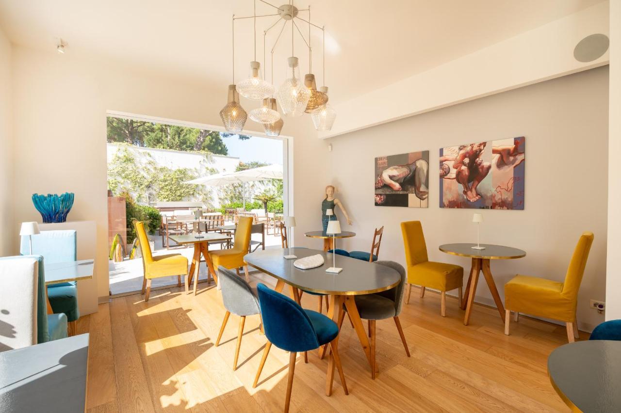 Unico Boutique Hotel D'Arte Мондело Екстериор снимка