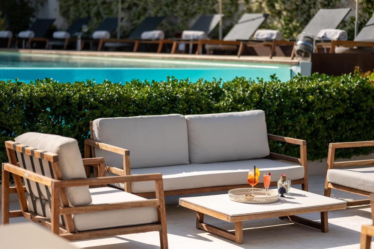 Unico Boutique Hotel D'Arte Мондело Екстериор снимка
