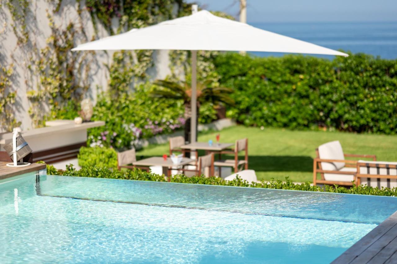 Unico Boutique Hotel D'Arte Мондело Екстериор снимка