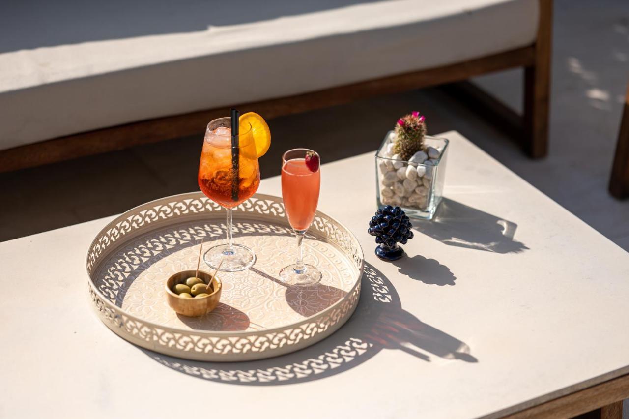 Unico Boutique Hotel D'Arte Мондело Екстериор снимка