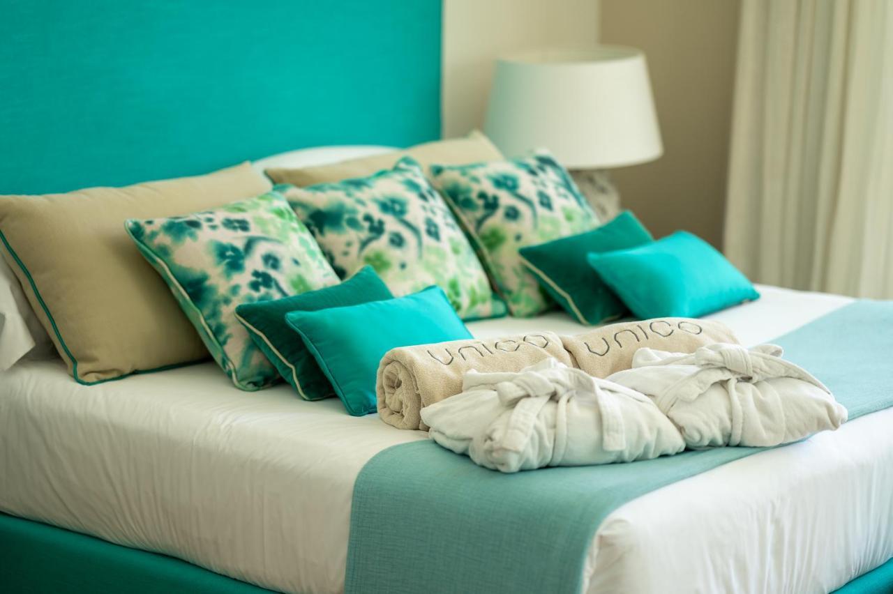 Unico Boutique Hotel D'Arte Мондело Екстериор снимка