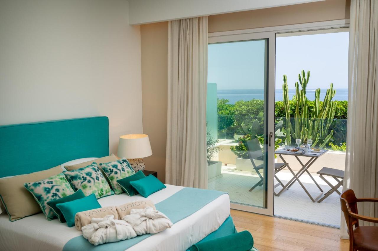 Unico Boutique Hotel D'Arte Мондело Екстериор снимка
