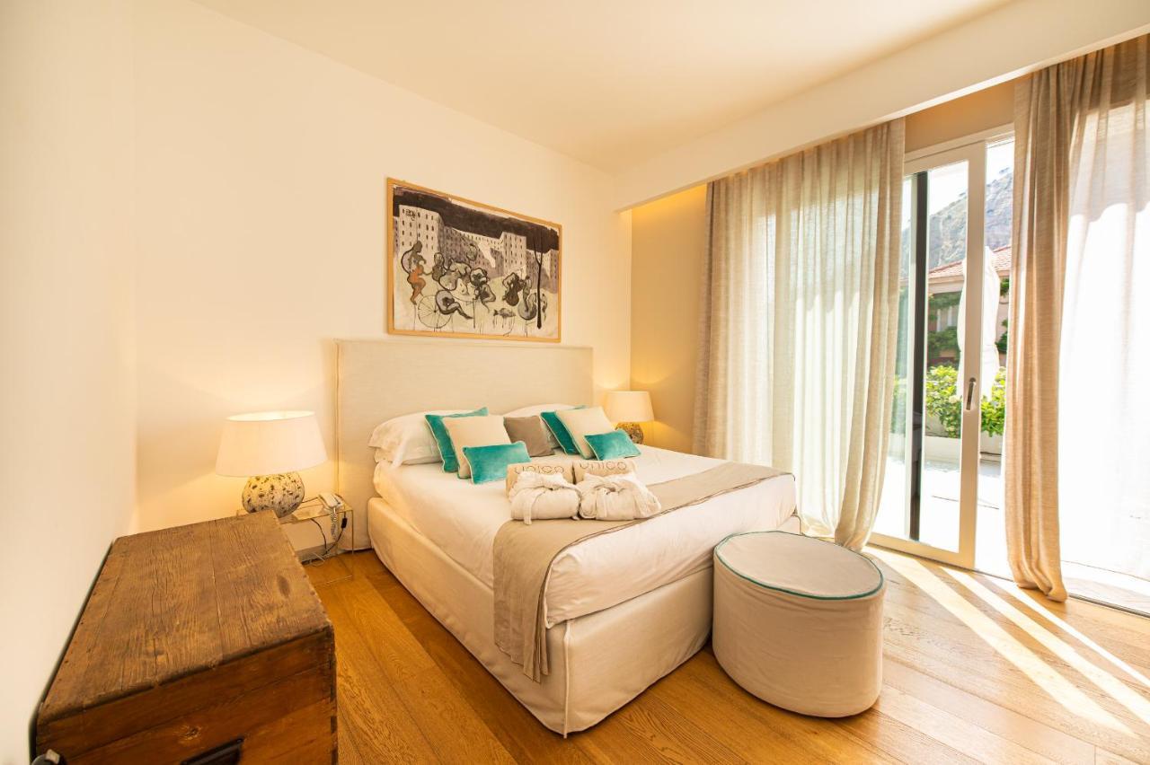 Unico Boutique Hotel D'Arte Мондело Екстериор снимка