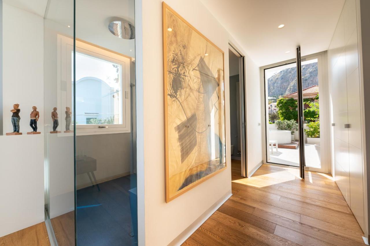 Unico Boutique Hotel D'Arte Мондело Екстериор снимка