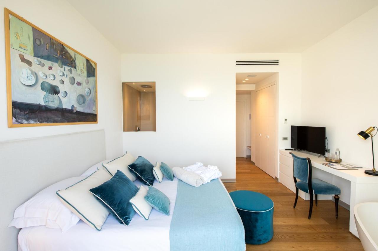 Unico Boutique Hotel D'Arte Мондело Екстериор снимка