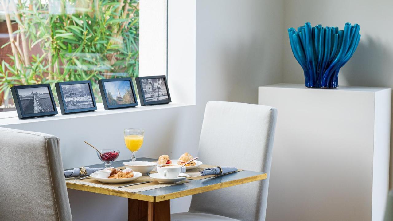 Unico Boutique Hotel D'Arte Мондело Екстериор снимка