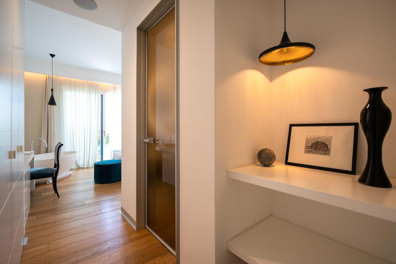 Unico Boutique Hotel D'Arte Мондело Екстериор снимка