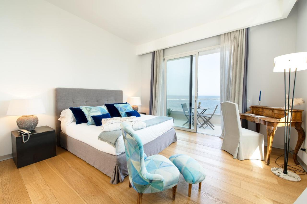 Unico Boutique Hotel D'Arte Мондело Екстериор снимка