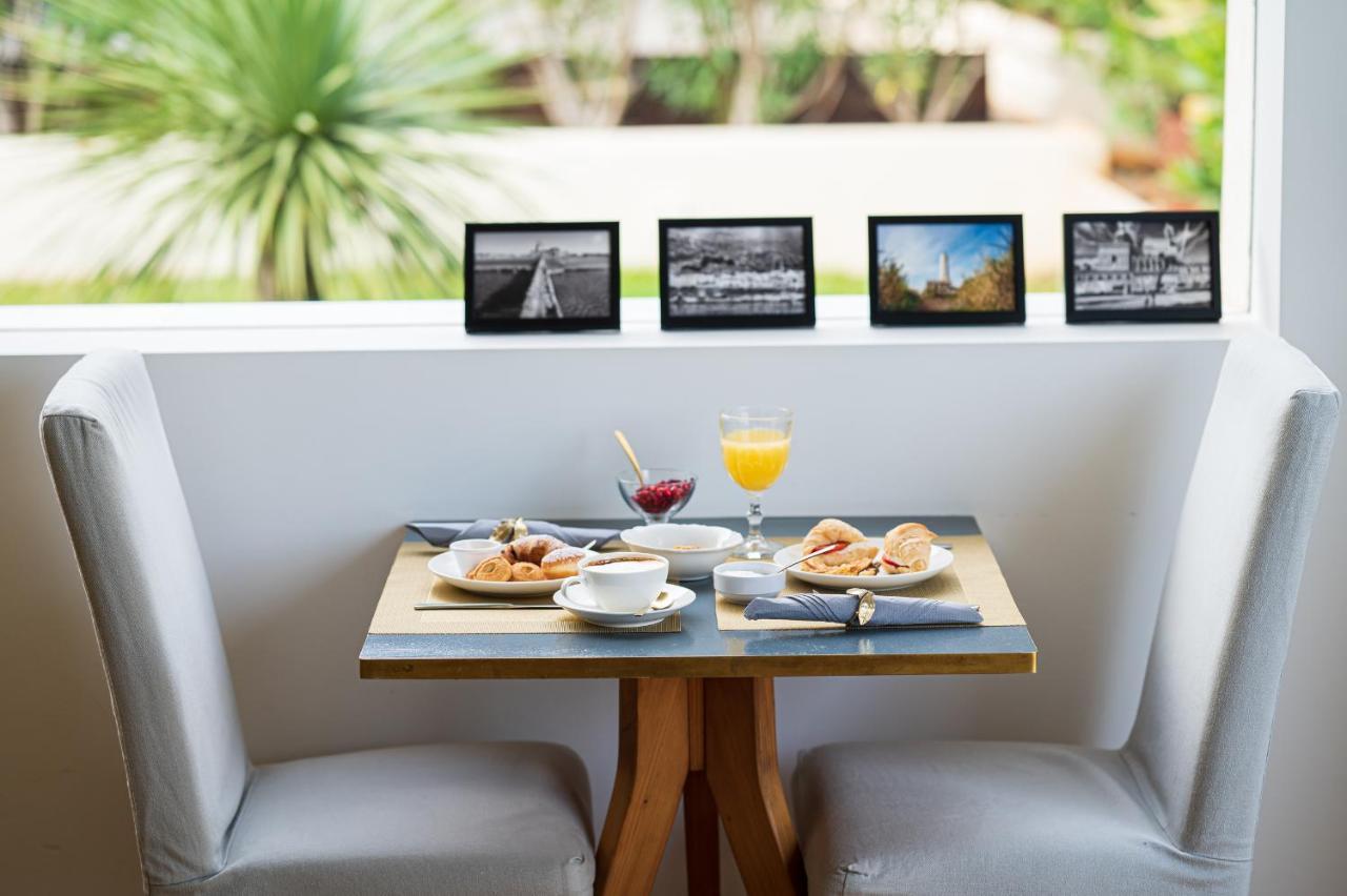 Unico Boutique Hotel D'Arte Мондело Екстериор снимка