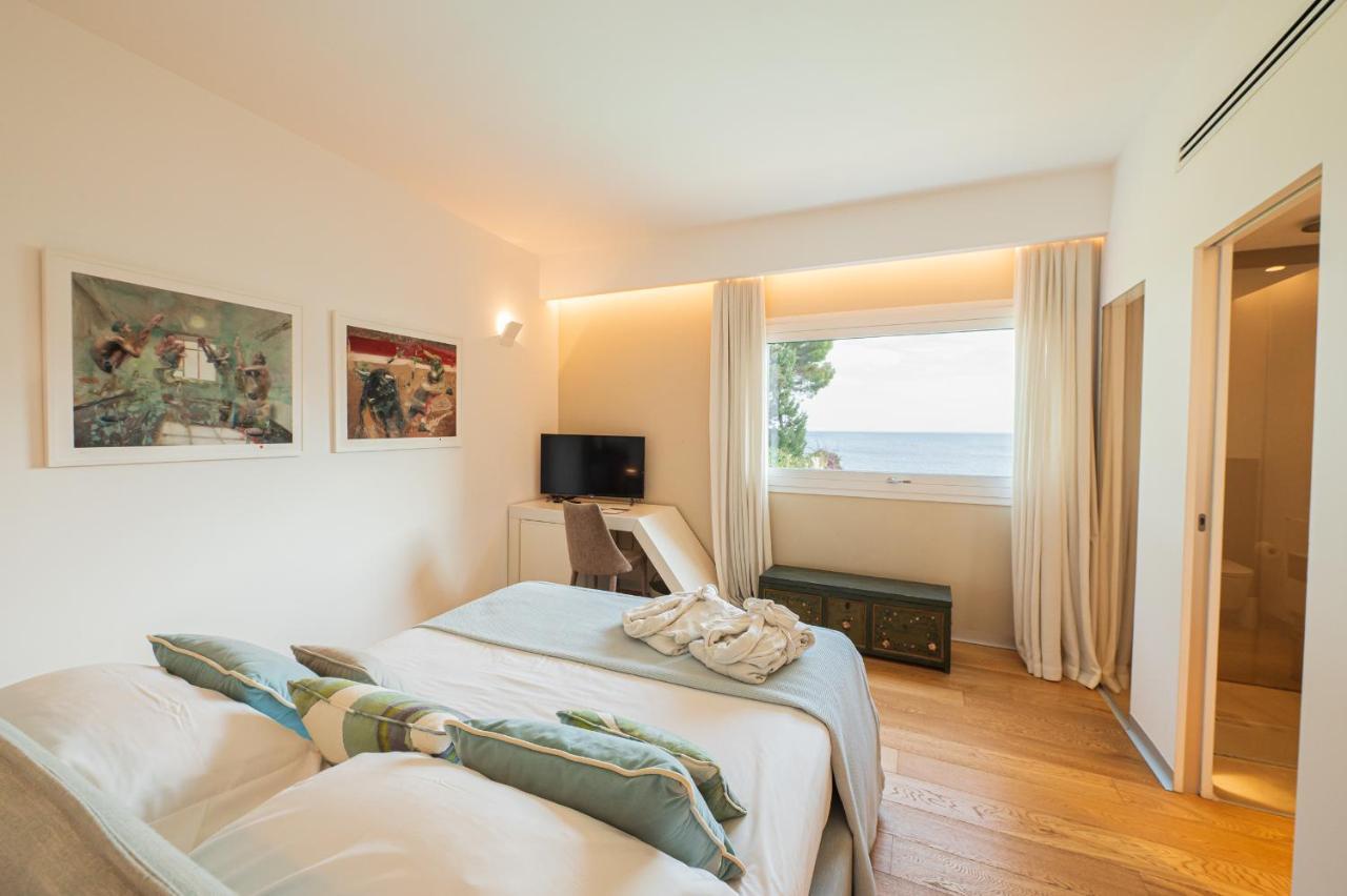 Unico Boutique Hotel D'Arte Мондело Екстериор снимка